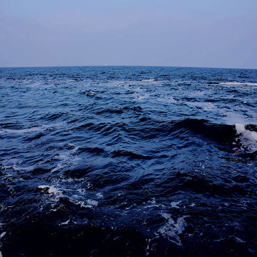 Toile de fond de la scène de la mer bleue d'Avezano pour la photographie 
